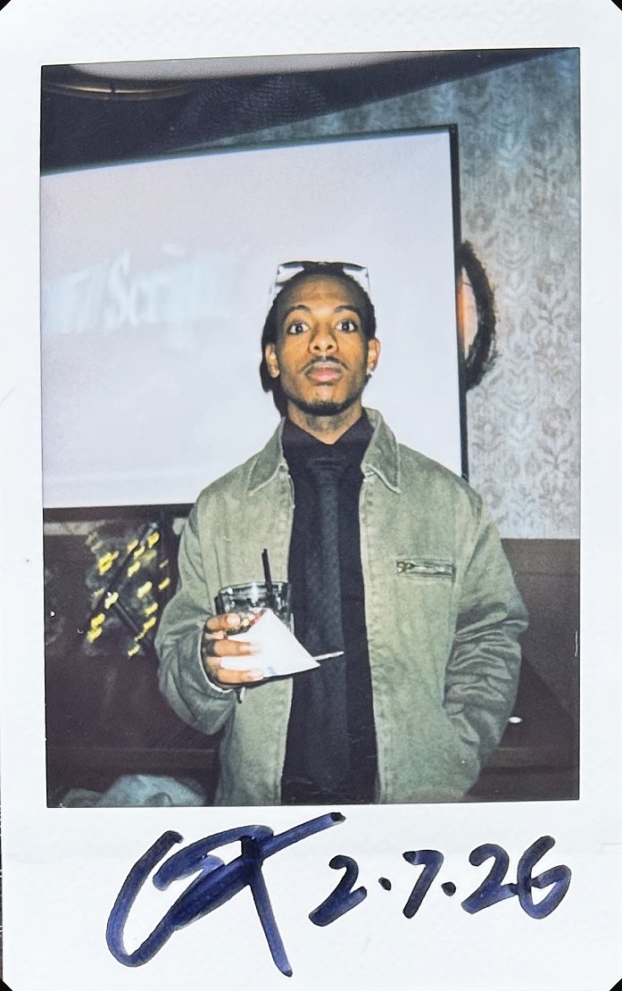 signed polaroid from take 001, no. 16