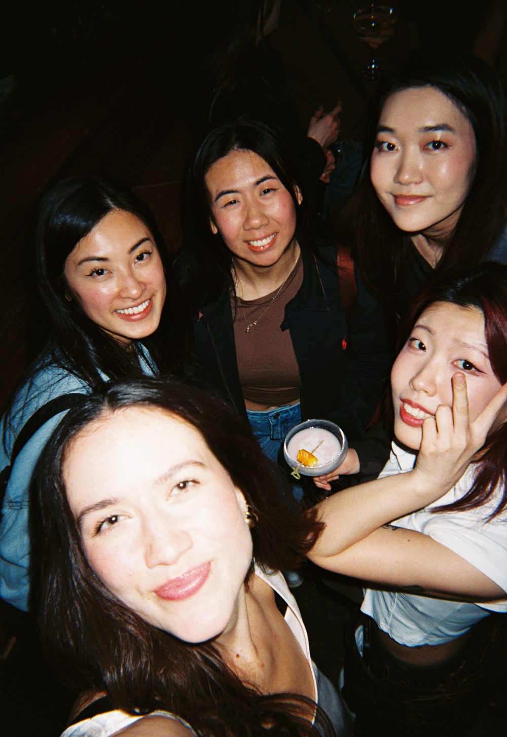 five members squeezed into one flash selfie — experience 13